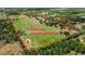 Expansive 26.9-acre parcel featuring a barndominium and multiple ponds surrounded by lush greenery at 28120 63Rd E Ave, Myakka City, FL 34251