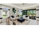 Bright living room features stylish furnishings and decor with a seamless transition to the outdoor space at 3169 Alba Cir, Bradenton, FL 34211