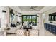 Inviting living room with bright, neutral furnishings, stylish decor, and view of the backyard at 3169 Alba Cir, Bradenton, FL 34211