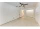 Spacious bedroom offering natural light, a ceiling fan, closet, and neutral walls at 3304 7Th Street W Ct, Palmetto, FL 34221