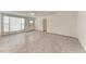 Living room featuring tile floors and a large window at 3304 7Th Street W Ct, Palmetto, FL 34221