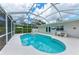 Inviting screened-in pool area featuring a pool, deck, and outdoor dining space at 3304 7Th Street W Ct, Palmetto, FL 34221