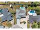 Overhead shot of a neatly arranged house, featuring a sparkling pool and a fully fenced backyard at 3507 24Th W Ave, Bradenton, FL 34205