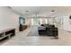 Bright living room area featuring wood-look tile flooring and neutral tones at 3507 24Th W Ave, Bradenton, FL 34205