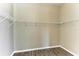 A spacious closet features ample storage with wire shelving and durable, wood-look flooring at 428 Grand Preserve Cv, Bradenton, FL 34212