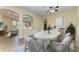 Elegant dining area featuring a large table and stylish seating at 428 Grand Preserve Cv, Bradenton, FL 34212