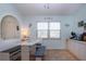 Charming eat-in kitchen nook with white bench seating and natural light at 4360 Flamingo Blvd, Port Charlotte, FL 33948