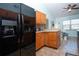 Charming kitchen with vaulted ceilings and a breakfast nook creates a cozy and inviting space at 4360 Flamingo Blvd, Port Charlotte, FL 33948