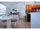 Cozy eat-in kitchen with stainless steel appliances and lots of natural light at 4360 Flamingo Blvd, Port Charlotte, FL 33948