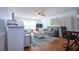 Bright and airy living room with modern furnishings, hardwood floors, and a ceiling fan at 4360 Flamingo Blvd, Port Charlotte, FL 33948