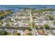 Aerial view of waterfront community with access to bay waters with homes along canals at 4406 17Th W St, Palmetto, FL 34221