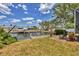 Seating area in the backyard with a view of the dock and canal at 4406 17Th W St, Palmetto, FL 34221