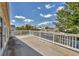Spacious balcony overlooking the canal features white railings and views of neighboring homes at 4406 17Th W St, Palmetto, FL 34221