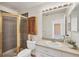 Bathroom with shower, vanity and mirrored cabinet at 4406 17Th W St, Palmetto, FL 34221