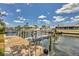 View of boat dock and lift at 4406 17Th W St, Palmetto, FL 34221