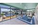 Outdoor lanai featuring tile floors, hot tub and screen to keep out insects at 4406 17Th W St, Palmetto, FL 34221