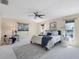 Spacious main bedroom with carpet, ceiling fan and many windows for lots of natural light at 4406 17Th W St, Palmetto, FL 34221