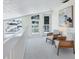 Loft sitting area with comfortable seating and natural light, overlooking neighborhood at 4406 17Th W St, Palmetto, FL 34221