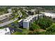 Aerial view highlighting the well-maintained apartment buildings, parking area, and lush greenery at 4440 Ironwood Cir # 509D, Bradenton, FL 34209