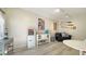 A cozy living room provides space for relaxing, complete with a small refrigerator and nautical decor at 446 Burns Ct, Sarasota, FL 34236