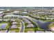 Scenic aerial perspective revealing a vast community with picturesque lakes winding through residential neighborhoods at 4820 Coastal Days Ln, Bradenton, FL 34211