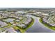Breathtaking aerial view capturing a network of lakes interwoven within a large, thriving residential development at 4820 Coastal Days Ln, Bradenton, FL 34211