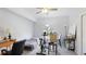 Bright bedroom with a window, desk, and comfortable seating, perfect for a home office or guest room at 5160 Northridge Rd # 206, Sarasota, FL 34238