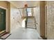 Clean, well lit hallway with stairs leading to upper floors in the building at 5160 Northridge Rd # 206, Sarasota, FL 34238
