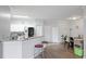 Bright kitchen with ample counter space and seamlessly connects to dining and living areas at 5160 Northridge Rd # 206, Sarasota, FL 34238