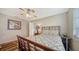 This cozy bedroom offers natural light and a peaceful view from the window at 5630 Golf Pointe Dr # 205, Sarasota, FL 34243