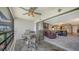 This patio has outdoor furniture, offering a view into the open living space at 5630 Golf Pointe Dr # 205, Sarasota, FL 34243