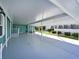 Wide angle view of the carport and outdoor sitting area at 5910 Majestic Way, Palmetto, FL 34221