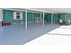 Large covered parking area perfect for entertaining or relaxing outdoors at 5910 Majestic Way, Palmetto, FL 34221