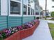 Pleasant shot of the exterior of the home and brick flower bed at 5910 Majestic Way, Palmetto, FL 34221