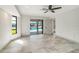 Bedroom with tile floors and a view of the lanai, pool and waterfront views at 6387 Shalimar St, Port Charlotte, FL 33981