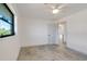 Bedroom featuring tile flooring and ensuite at 6387 Shalimar St, Port Charlotte, FL 33981