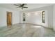 Spacious bedroom with tile flooring and light-filled windows at 6387 Shalimar St, Port Charlotte, FL 33981