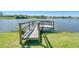 Private wooden dock for enjoying waterfront views and recreational activities on the water at 6387 Shalimar St, Port Charlotte, FL 33981