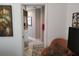 View into the ensuite bathroom shows modern tile flooring and bright lighting at 6821 Fairview Ter # 6821, Bradenton, FL 34203