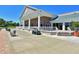 Elegant clubhouse featuring stately columns, a covered entry, and a convenient golf cart at 6821 Fairview Ter # 6821, Bradenton, FL 34203