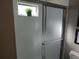 Shower with glass door and window in bathroom at 6821 Fairview Ter # 6821, Bradenton, FL 34203