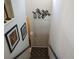 Stairway to front door with art and palm tree decoration at 6821 Fairview Ter # 6821, Bradenton, FL 34203