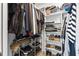 Walk in closet with built in shelving, hanging racks, and shoe storage at 7122 11Th W Ave, Bradenton, FL 34209