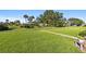 Scenic view of the well-manicured community with lush lawns and mature trees, perfect for strolling at 7122 11Th W Ave, Bradenton, FL 34209