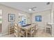 Sunlit dining room with wood table, an abundance of natural light, and seating for six at 7122 11Th W Ave, Bradenton, FL 34209
