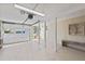 Spacious garage with epoxy floors and access to the outdoors at 7122 11Th W Ave, Bradenton, FL 34209