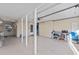 Spacious garage with epoxy floors, storage and access to the home's interior at 7122 11Th W Ave, Bradenton, FL 34209