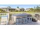 Outdoor bar area with stools, countertop and grill, perfect for entertaining at 7122 11Th W Ave, Bradenton, FL 34209