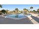 Community pool with tile accents, plenty of seating and a covered picnic area at 7122 11Th W Ave, Bradenton, FL 34209