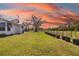 Expansive backyard offering a serene landscape with lush green grass, beautiful trees, and plenty of space at 7150 Richardson Rd, Sarasota, FL 34240